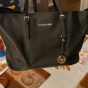 Michael Kors black purse. Used but In good condition.